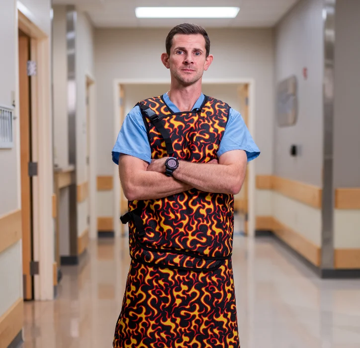 man wearing clean lead apron
